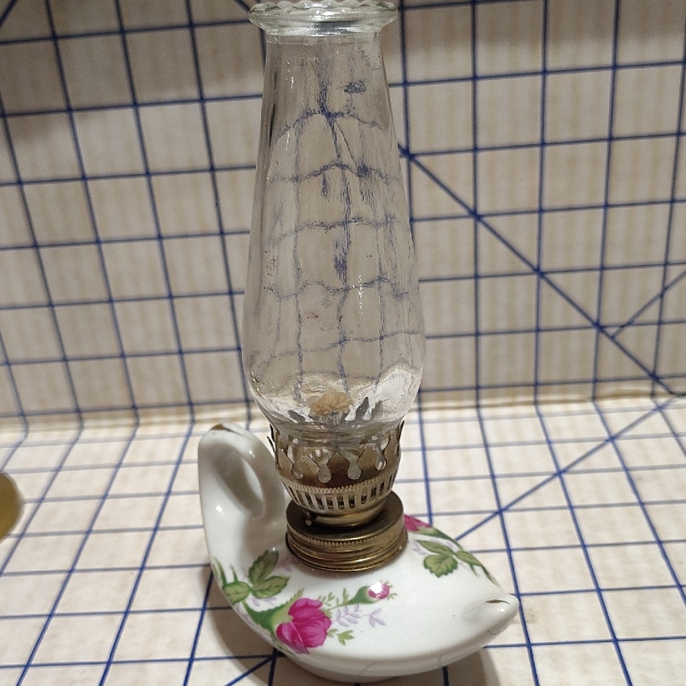 This item is a Vintage Miniature Rosebud Aladdin Oil Lamp